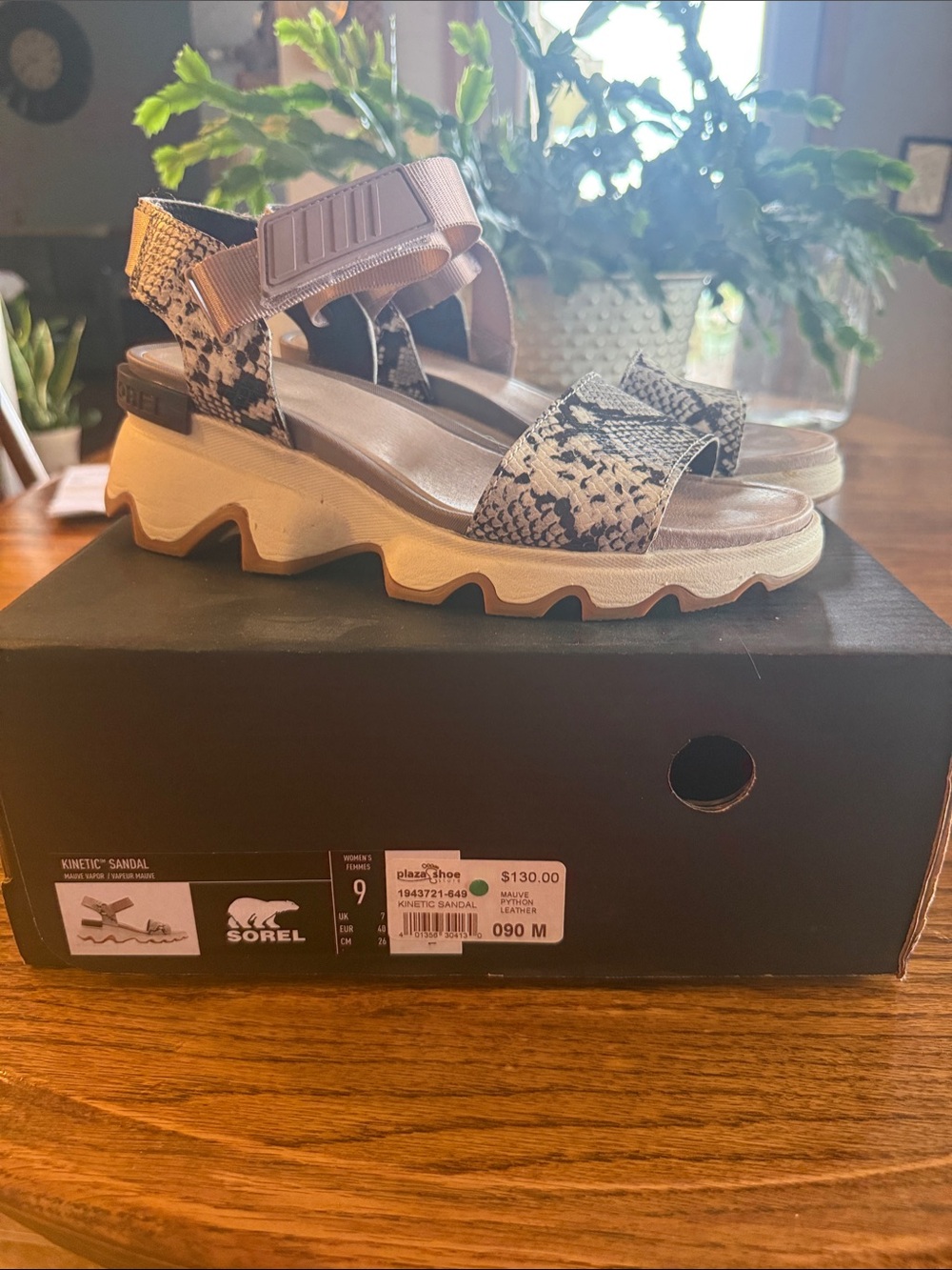 Sorel Kinetic Platform Sandal in Black and Cream Snake Print